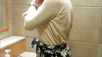 Beautiful crossdresser jerked off in a rest room